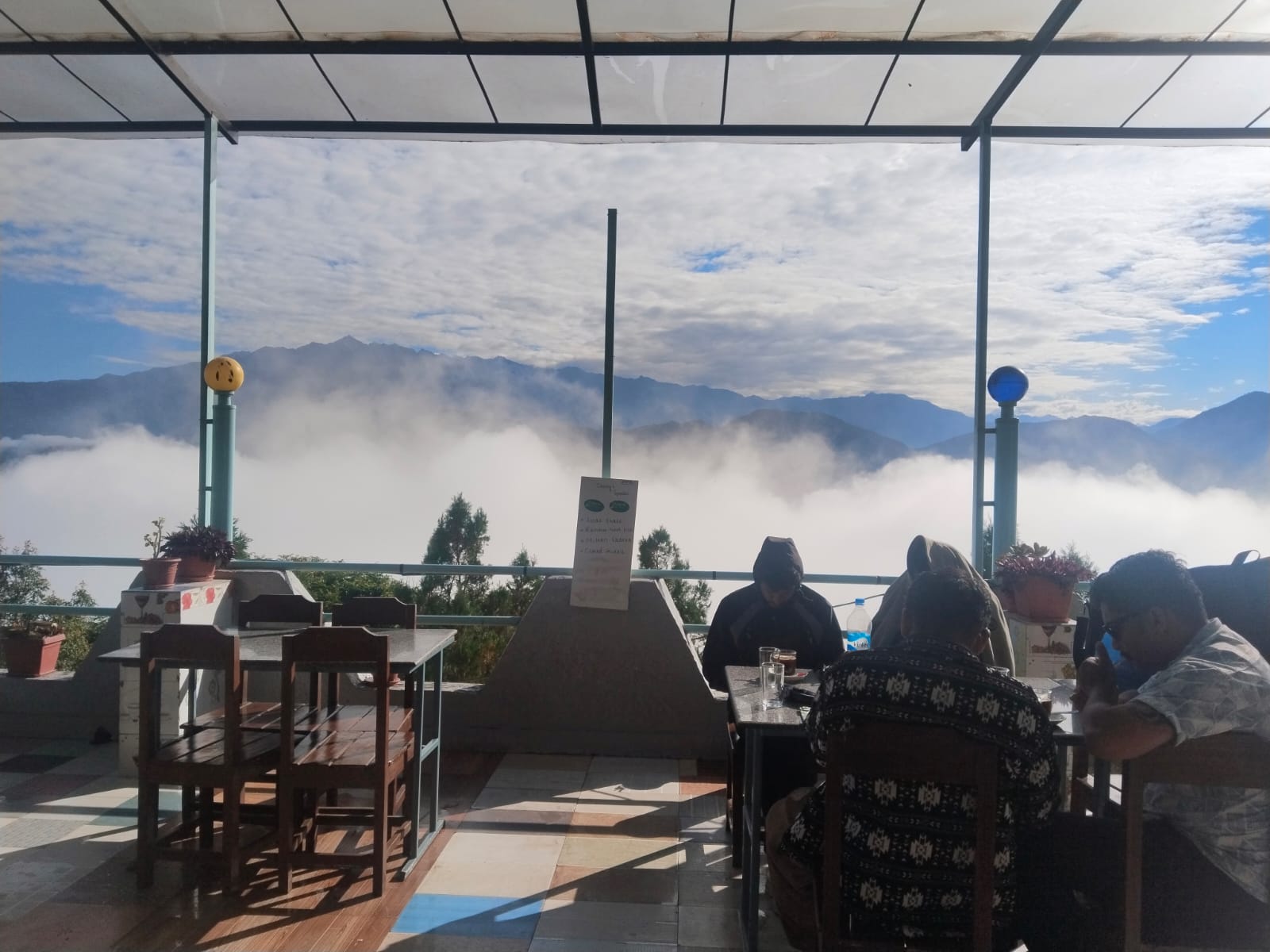 Terrace seating with a view of the hills
